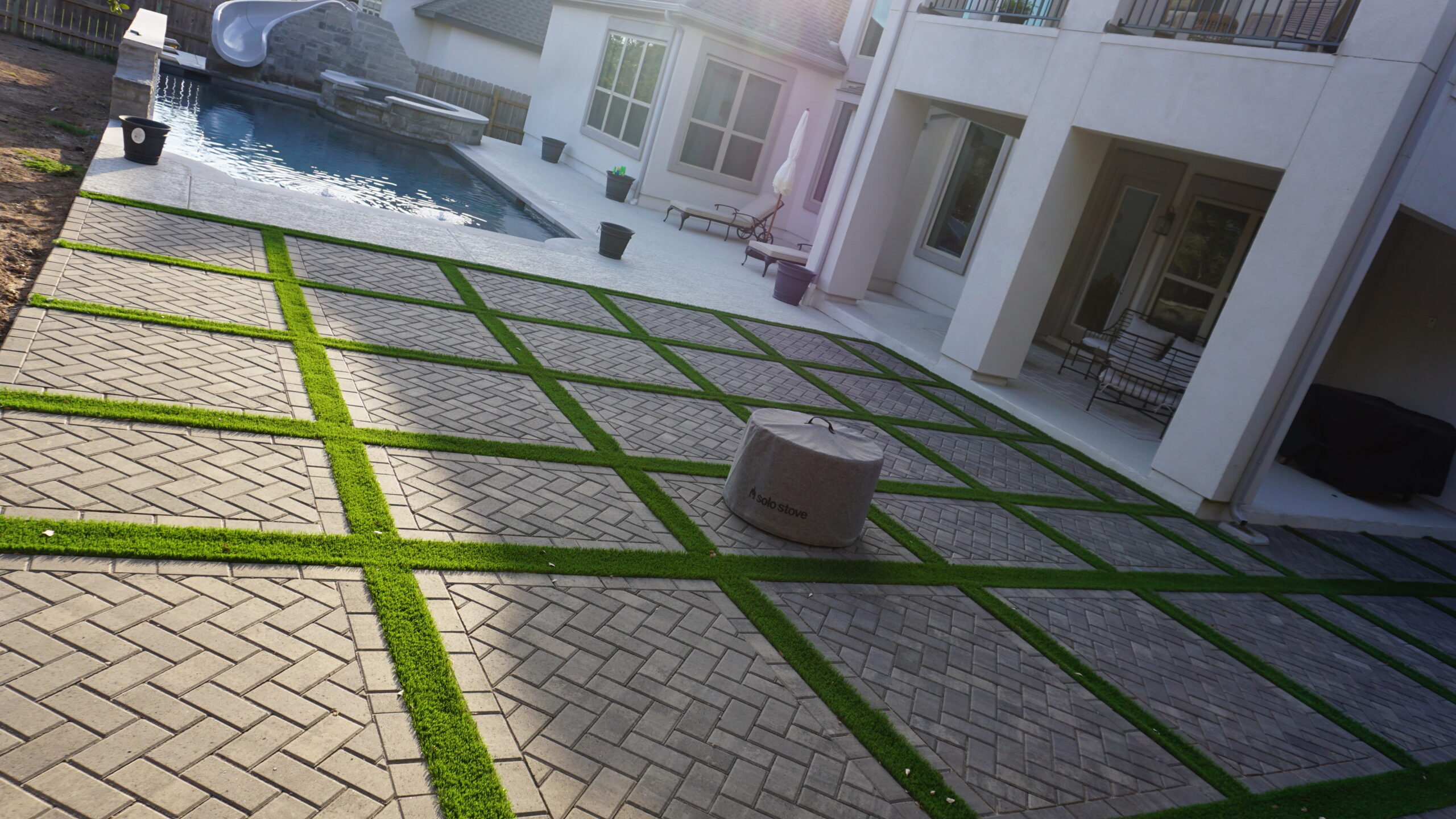 Paver patio with turf installation